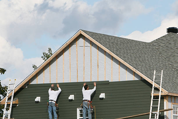 Professional Siding Replacement technician working in Houston, OH